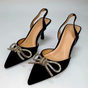 Holiday Party Heels 
Black pumps with bling detail 
3.25” heel 
Brand new in box